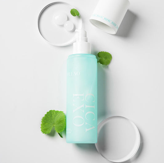 D'LEXO CICA EXO COMFORTING EMULSION.
Skincare product with a light blue bottle and white cap on a white background