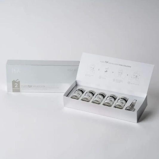 D'LEXO PDX2. Set of skincare serum bottles in a box on a light gray background