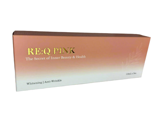 REQ Pink skincare product box on a marble surface