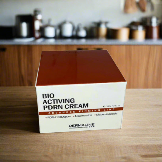 Box of Bio Activating PDRN Cream on a marble surface